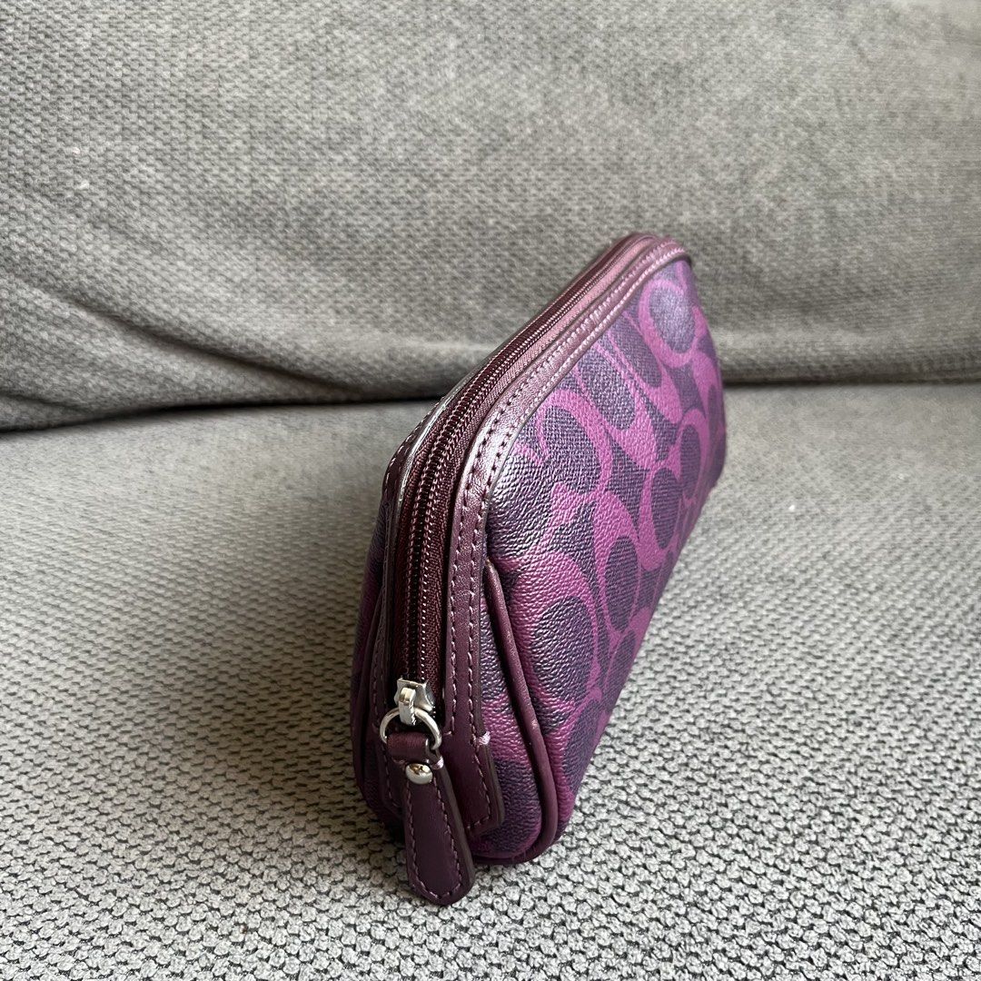 Authentic Coach Japan Leather Purple Monogram Makeup Bag Pouch (Category: Purses & Pouches) located in Silang. Submitted by f4iry4rch1ve (Listing ID 1444598544, Image 2). Description: Authentic Coach Japan Leather Purple Monogram Makeup Bag Pouch 1200 php+ sf Condition: 10/10 Dimensions: view the pictures above -authentic (no brand tag but it is auth, you may search it on Google) -from Japan - actual photos Note: Colors may vary due to lighting P