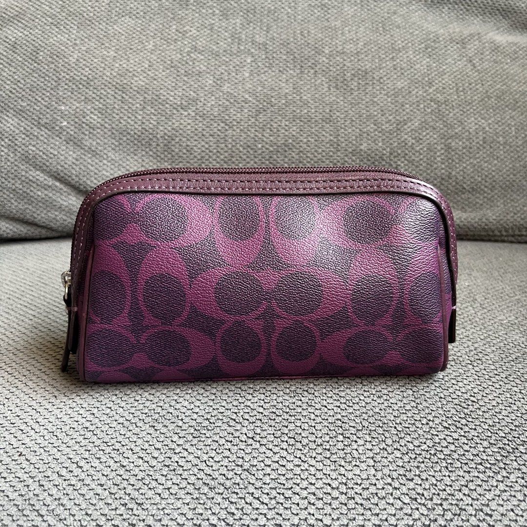 Authentic Coach Japan Leather Purple Monogram Makeup Bag Pouch (Category: Purses & Pouches) located in Silang. Submitted by f4iry4rch1ve (Listing ID 1444598544, Image 1). Description: Authentic Coach Japan Leather Purple Monogram Makeup Bag Pouch 1200 php+ sf Condition: 10/10 Dimensions: view the pictures above -authentic (no brand tag but it is auth, you may search it on Google) -from Japan - actual photos Note: Colors may vary due to lighting P