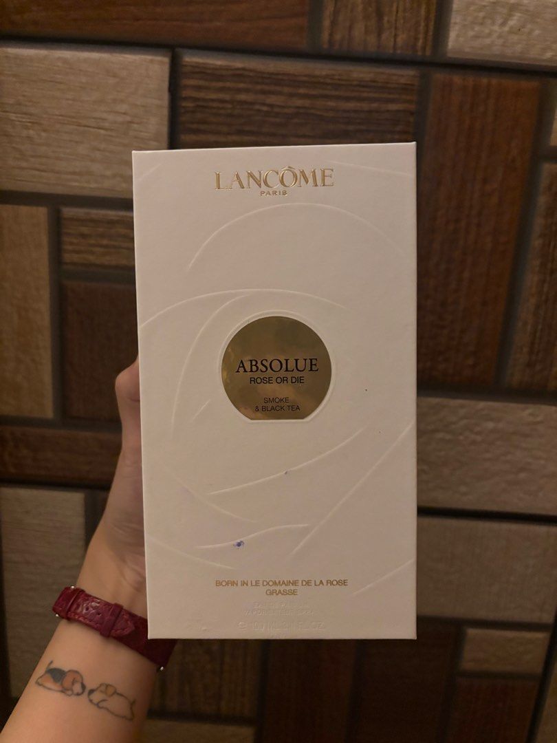 Authentic Lancome Absolue Rose Or Die Eau de Parfum (Category: Fragrance & Deodorants) located in Quezon City. Submitted by mc3nidad (Listing ID 1444506495, Image 2). Description: - Lancôme Absolue Rose Or Die perfume - Scent: Smoke & Black Tea - Condition: Full bottle, original box included - Authenticity: Purchased directly from Lancome USA - Ideal for: Perfume collectors or those seeking a unique fragrance.