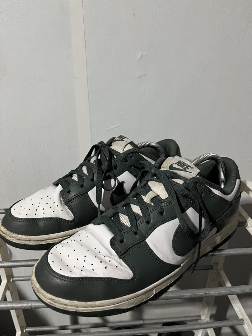 Authentic Nike Dunk Low Vintage Green (Category: Sneakers) located in Manila. Submitted by bolver (Listing ID 1444642333, Image 1). Description: - Nike Dunk Lows - Classic White and vintage Green colorway - Minor creasing on toe box - Comes with shoe trees - Comes with original box.