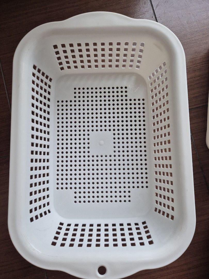 Basket 35x25x10 (Category: Laundry Baskets) located in Makati City. Submitted by zotag (Listing ID 1439801884, Image 1). Description: - White rectangular basket - Perforated design for ventilation - Features handles for easy carrying - Made of durable plastic - Slightly curved design - Perfect for clothes and other items.