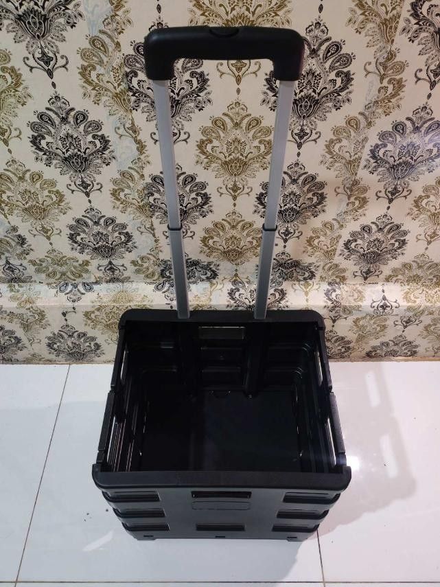 Black Folding Trolley Cart with Wheels and Handle (Category: Everything Else Others) located in Manila. Submitted by blake_05 (Listing ID 1444536920, Image 3). Description: - Black folding trolley cart - Features wheels and a retractable handle - Folds flat for convenient storage - Ideal for groceries, shopping, or moving items - Sturdy and portable design - Useful for both home and travel needs.