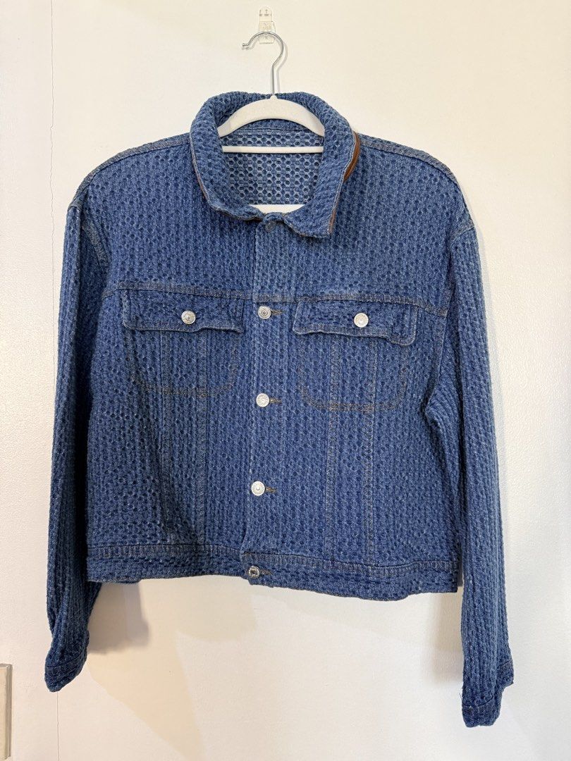 Blue Textured Denim Jacket with Brown Leather Collar (Category: Coats, Jackets and Outerwear) located in Quezon City. Submitted by yourheaduhunter (Listing ID 1444562031, Image 1). Description: - Classic blue denim jacket - Unique textured fabric all over - Brown faux leather collar detail - Button-up front with chest pockets - Great for layering or wearing solo - Essential wardrobe staple.