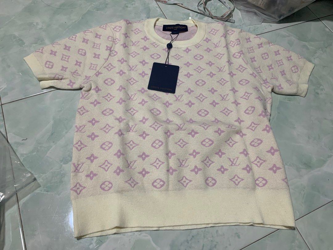 Brand new Lv knit tencel and silk top M ptp 47cm length 53cm (Category: Blouses) located in Singapore. Submitted by lovescarf8 (Listing ID 1444539373, Image 1). Description: Rejected STOck not for fussy.