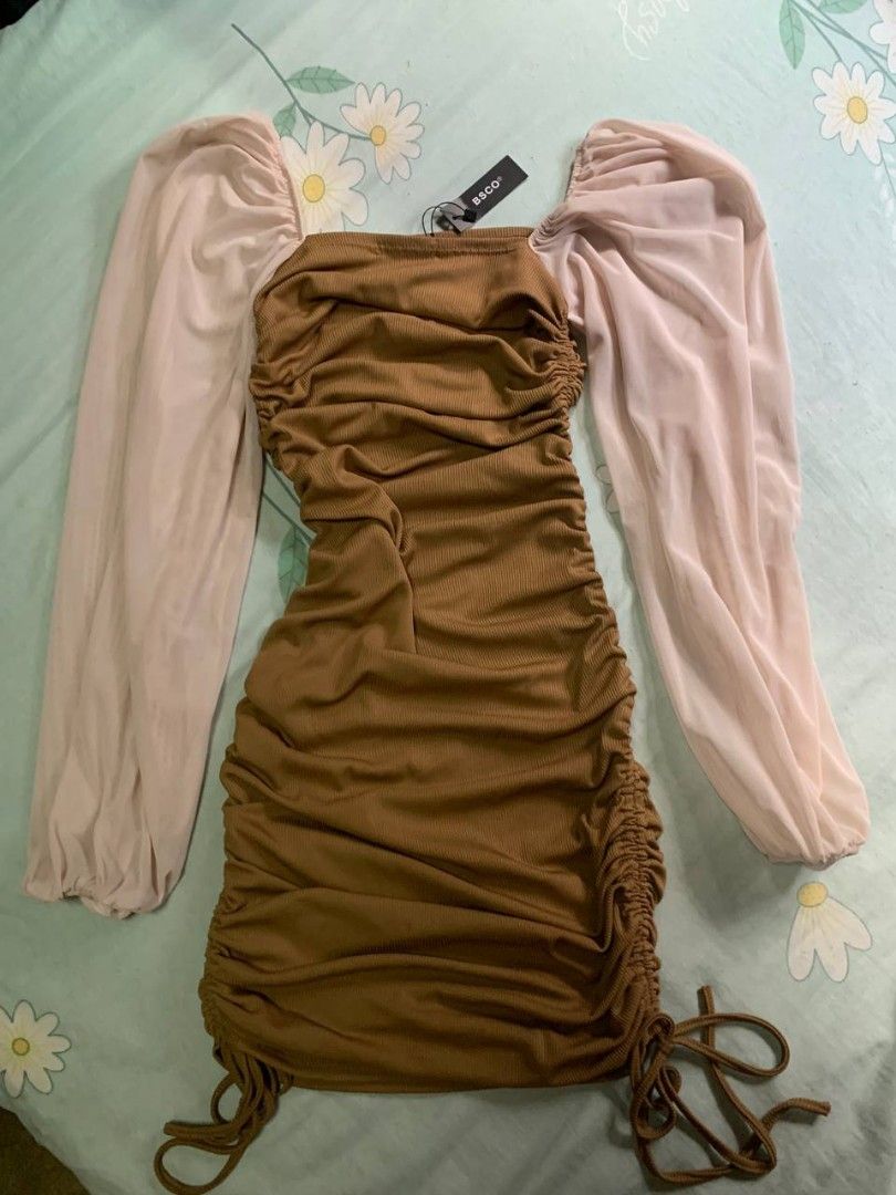BSCO Ruched Mesh Sleeve Bodycon Dress (Category: Dresses) located in Quezon City. Submitted by riri_29 (Listing ID 1444579162, Image 2). Description: - Brown ribbed bodycon dress - Sheer puff sleeves - Ruching all over with side drawstrings - Square neckline - Estimated size S - Ideal for night outs or parties.
