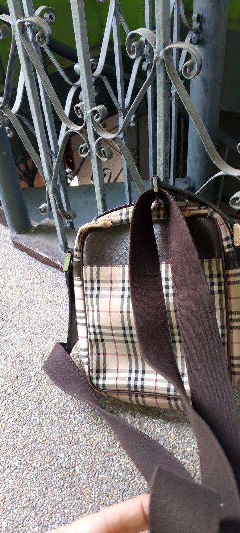 Burberry Nova Check Crossbody Bag (Category: Luxury Bags & Wallets) located in Caloocan City. Submitted by nobleflower_4c42cc (Listing ID 1444560090, Image 2). Description: - Classic Burberry crossbody bag - Iconic Nova Check pattern - Genuine leather trim and strap - Interior zippered pocket - Perfect for everyday use - Shows some signs of wear on leather trim and corne authentic but may flaws.
