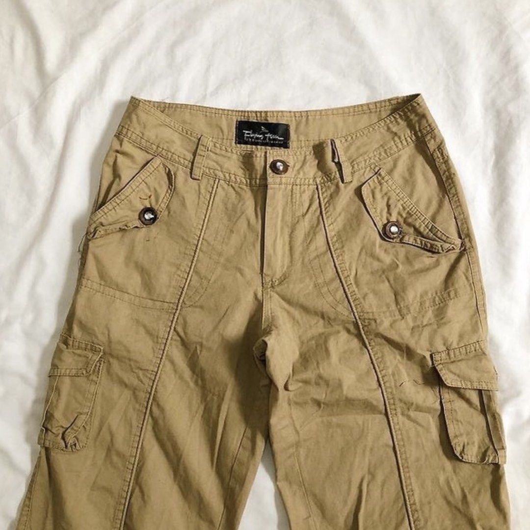 Cargo Pants Khaki Tan Color (Category: Other Bottoms) located in Marikina City. Submitted by naiomeww (Listing ID 1444504208, Image 1). Description: - Condition: 8/10 - Brand: Flying Fish - Type: Khaki Cargo Pants - Size: S-M (waist: 28 inches) (length: 36 inches) - Features: Multiple pockets, including zippered ones - Adjustable ties at the ankles - Style: Great for casual wear - flaws: Minor marks on the front & back buttons [nag rust] & few st