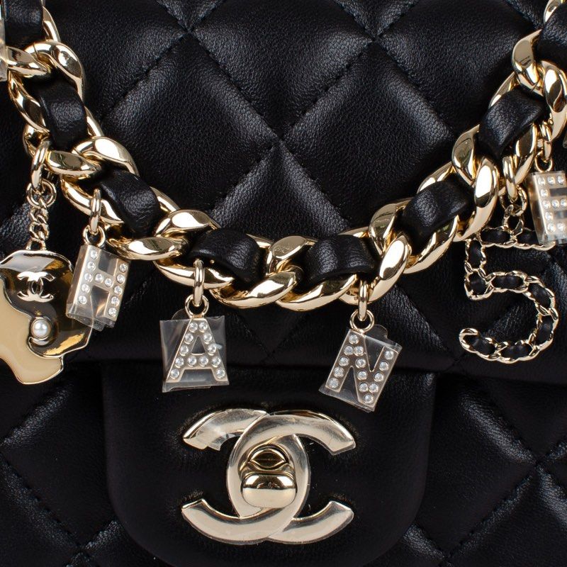 Chanel Coco Charms Mini Rectangular Black Top Handle Bag (Category: Luxury Bags & Wallets) located in Manila. Submitted by csy83705 (Listing ID 1444513064, Image 2). Description: Material: Lambskin Leather, Gold Tone Year: 2020 Stamp: 30972824 With original dust bag and authenticity card from Chanel.