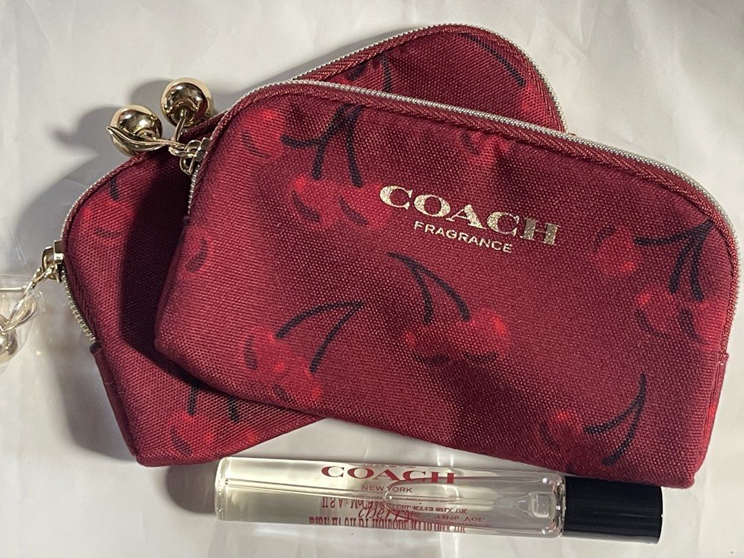 Coach Cherry Cosmetic Pouches 7.5ml (Category: Fragrance & Deodorants) located in Manila. Submitted by danigurl_ (Listing ID 1444661553, Image 1). Description: - adorable Coach cosmetic pouches featuring a charming cherry print. - Each pouch has a stylish gold ball zipper pull. - Comes with a Coach rollerball fragrance. - Ideal for travel or keeping your daily essentials organized in your purse. - Compact size fits easily into any handbag..
