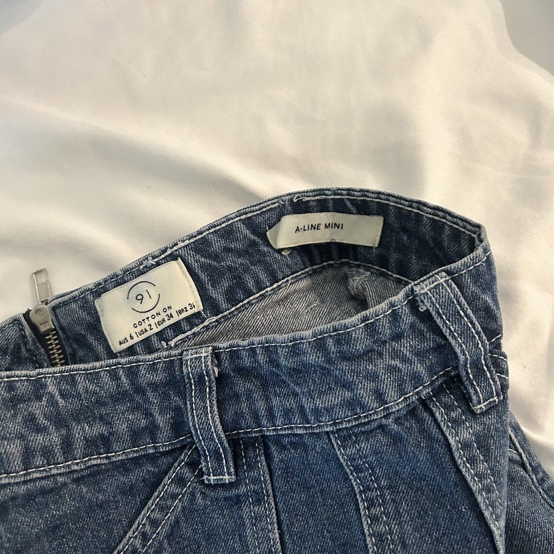 Cotton On A-Line Mini Denim Skirt (Category: Skirts) located in Calamba. Submitted by baskybears (Listing ID 1444560227, Image 2). Description: - Cotton on dark denim mini skirt - rfs: doesnt fit me anymore.