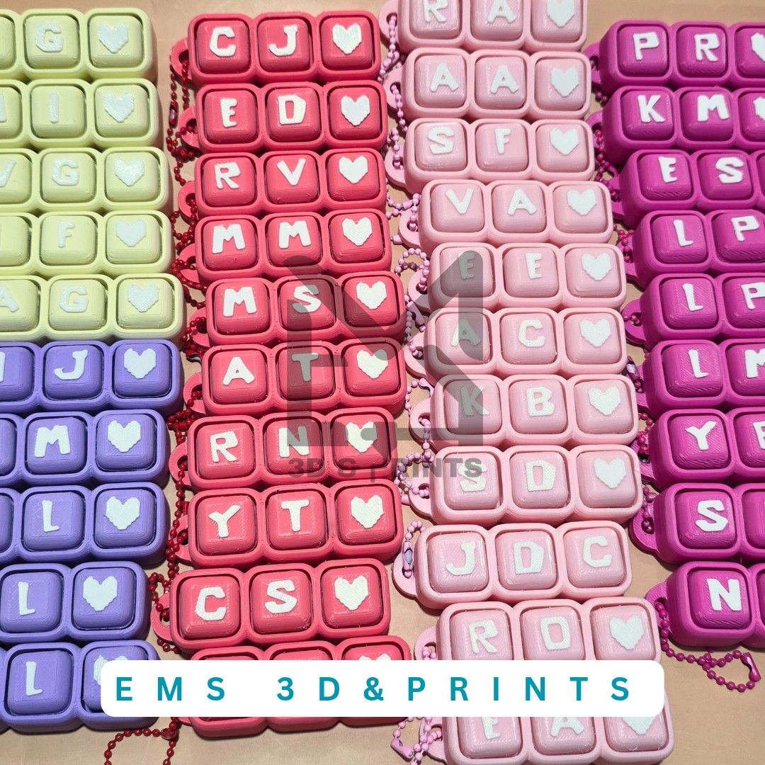 Custom 3D Printed Name Keychains - Cloud & Keyboard Styles (Category: Handmade Craft) located in Manila. Submitted by annlicious (Listing ID 1444617550, Image 2). Description: - Personalized 3D printed keychains - Choose from cloud or keyboard key shapes - Available in many colors and with custom names - Great for bags, backpacks, or as unique gifts - Each keychain is unique and made to order.