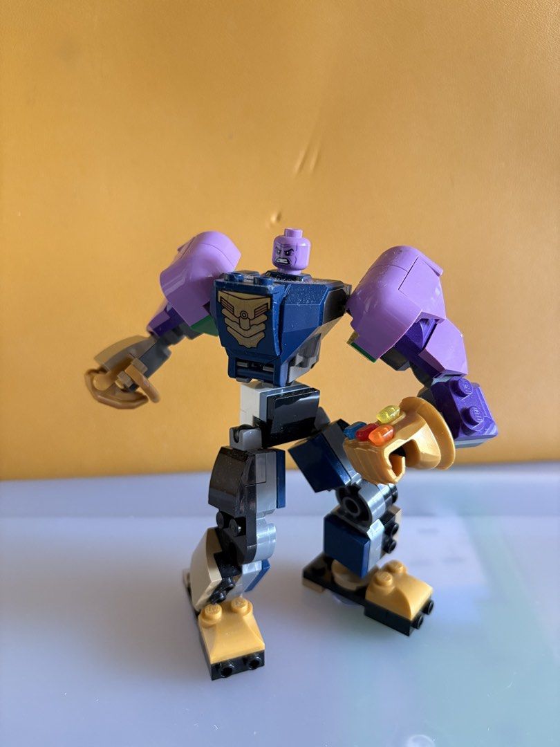 Custom Lego Thanos Mech with Infinity Gauntlet (Category: Lego & Building Sets) located in Quezon City. Submitted by jra_gcg (Listing ID 1444530946, Image 1). Description: - Custom-built Lego Thanos Mech figure - Features Infinity Gauntlet with all stones on left hand - Built with purple, blue, and gold Lego pieces - Poseable limbs for dynamic display ☀️ No box nor instructions that come with. ☀️ Negotiable just don’t lowball.