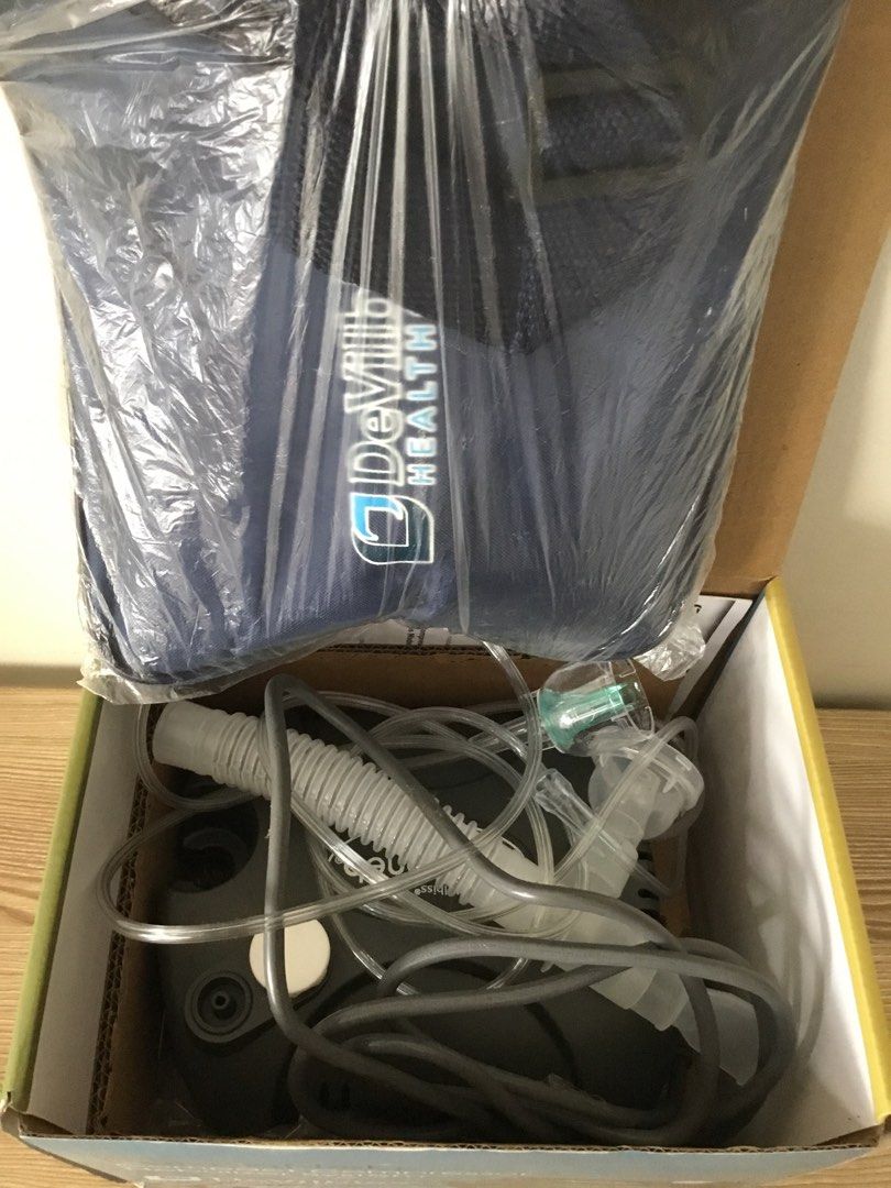 DeVilbiss HealthCare Nebulizer Machine with Accessories (Category: Medical Supplies & Tools) located in Manila. Submitted by declutteringpixie (Listing ID 1444503701, Image 1). Description: - DeVilbiss HealthCare nebulizer kit - Includes main unit, tubing, mask, and accessories - Comes in original packaging - Ideal for respiratory treatments -only opened,never used.