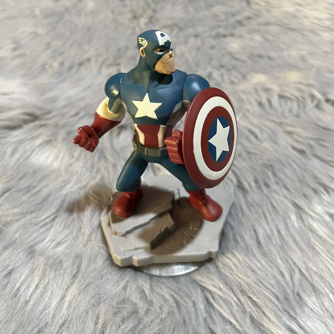 Disney Infinity Captain America Figure (Category: Figurines & Statues) located in Manila. Submitted by declutterfairy_ph (Listing ID 1444508742, Image 1). Description: Figure has minor dents but still in good condition. 8/10.