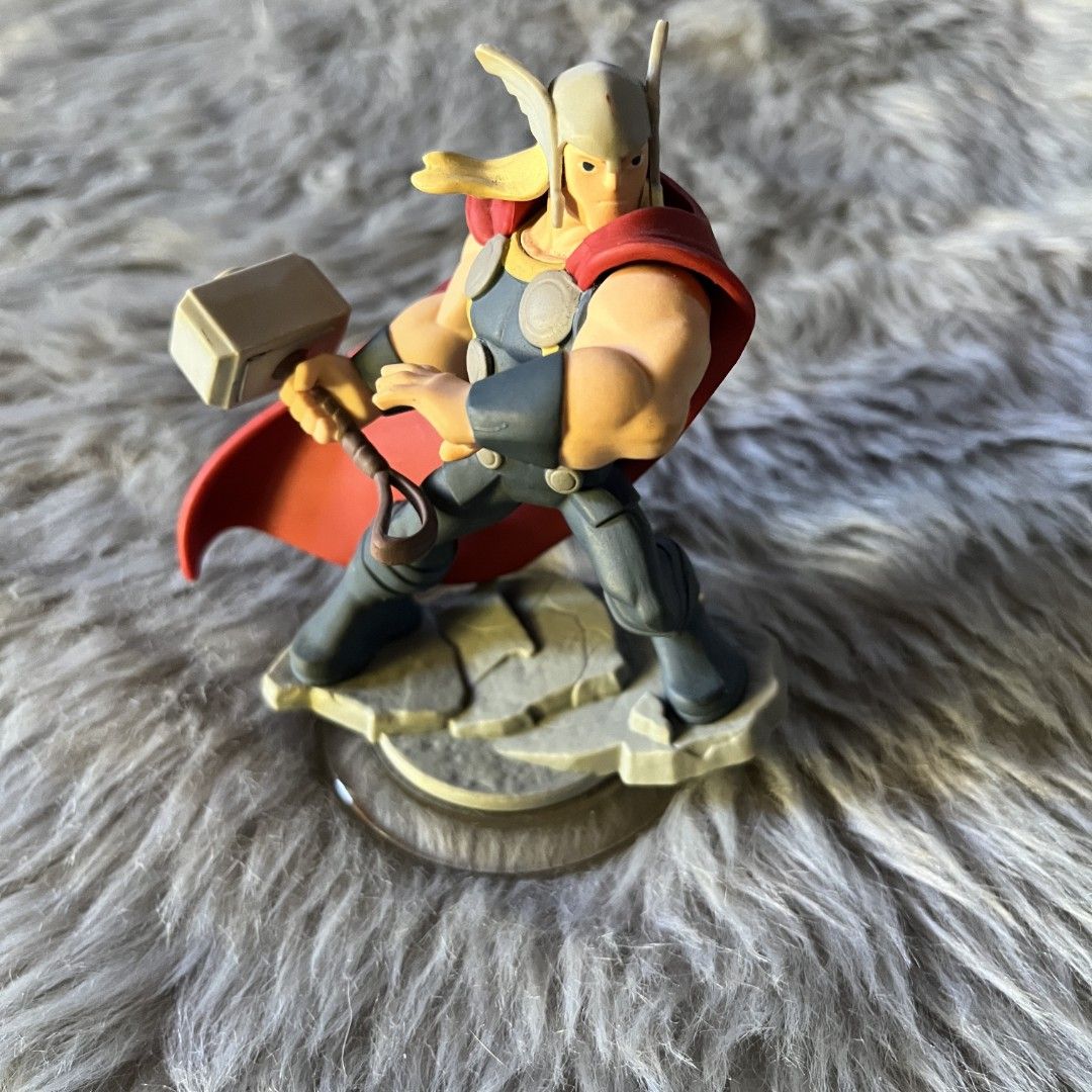 Disney Infinity Thor Figure (Category: Figurines & Statues) located in Manila. Submitted by declutterfairy_ph (Listing ID 1444509217, Image 1). Description: Figure has minor dents but still in good condition. 8/10.