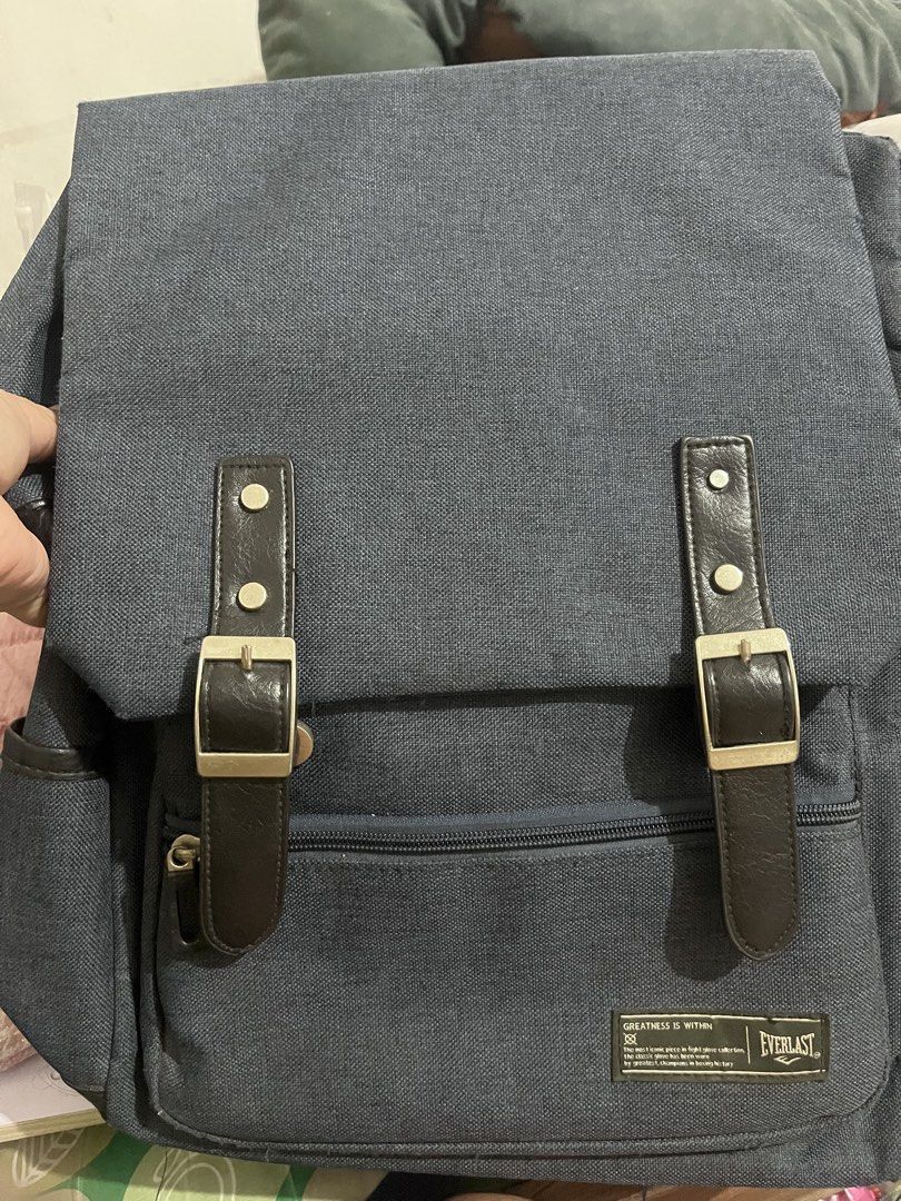 Everlast denim color backpack |free shipping (Category: Backpacks) located in Iloilo. Submitted by youronlinesister (Listing ID 1444516914, Image 3). Description: Everlast backpack with laptop compartment Preloved with flaws Approx 15x11.5 inches Maganda pa sya pero may issue *Please see one screw sa front replaced so maliit sya kaysa 3 screws *Adjuster sa likod is sira na see pic, tinatali na pang sya pag gagamitin *signs of use near zipper see 