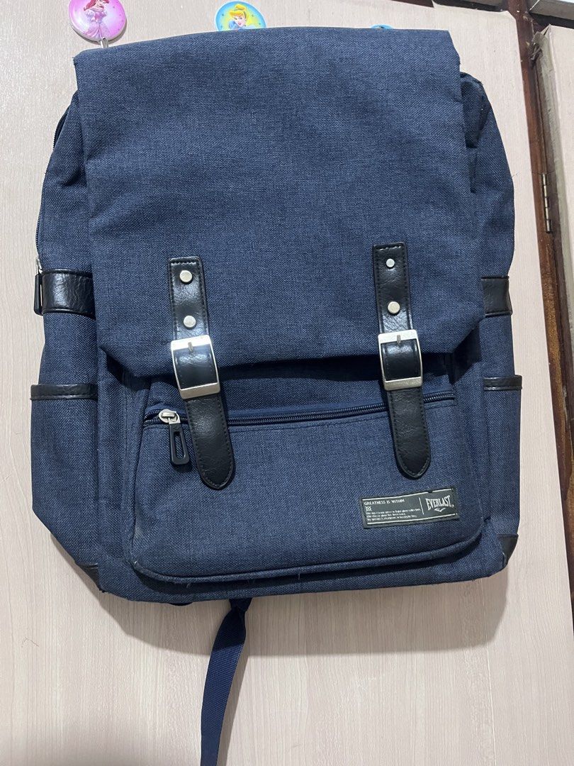 Everlast denim color backpack |free shipping (Category: Backpacks) located in Iloilo. Submitted by youronlinesister (Listing ID 1444516914, Image 1). Description: Everlast backpack with laptop compartment Preloved with flaws Approx 15x11.5 inches Maganda pa sya pero may issue *Please see one screw sa front replaced so maliit sya kaysa 3 screws *Adjuster sa likod is sira na see pic, tinatali na pang sya pag gagamitin *signs of use near zipper see 