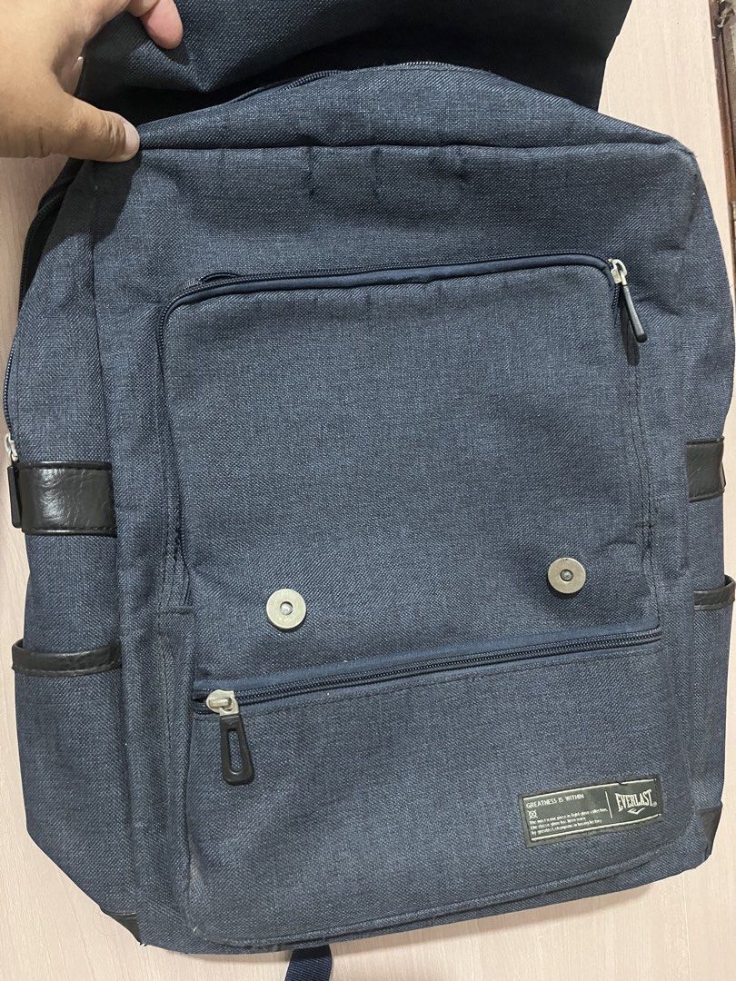 Everlast denim color backpack |free shipping (Category: Backpacks) located in Iloilo. Submitted by youronlinesister (Listing ID 1444516914, Image 2). Description: Everlast backpack with laptop compartment Preloved with flaws Approx 15x11.5 inches Maganda pa sya pero may issue *Please see one screw sa front replaced so maliit sya kaysa 3 screws *Adjuster sa likod is sira na see pic, tinatali na pang sya pag gagamitin *signs of use near zipper see 