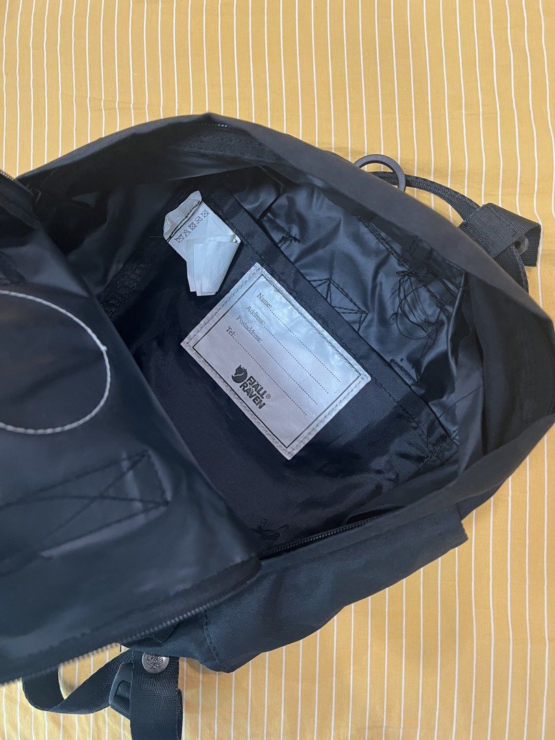 Fjallraven Kanken Mini Black Backpack (Category: Diaper Bags & Wetbags) located in Bay. Submitted by charlenesy (Listing ID 1444577546, Image 3). Description: -Authentic -Only one zipper is working yet can secure the bag - Stitches ripped on the inside (minimal) .