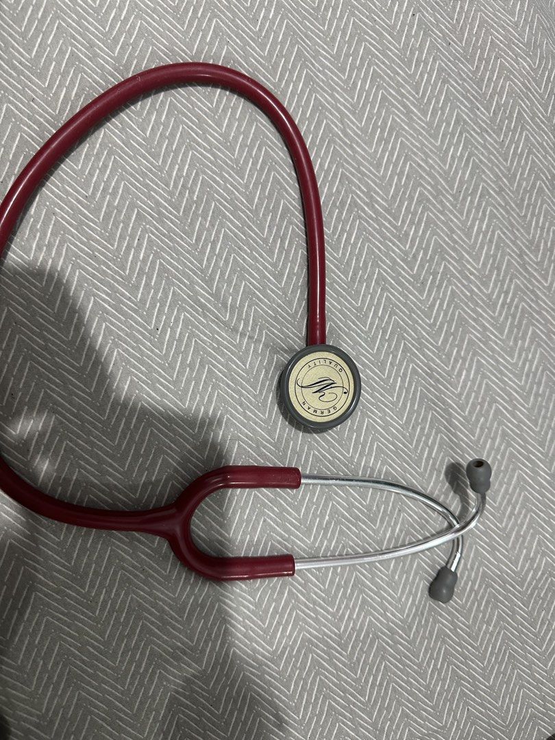German Quality Stethoscope - Burgundy (Category: Medical Supplies & Tools) located in Mandaluyong City. Submitted by josa_xox0i8 (Listing ID 1444657897, Image 3). Description: - Burgundy stethoscope with 'German Quality' printed on the chestpiece. - Deep red tubing for a stylish look. - Comfortable grey ear tips. - Ideal for medical students and healthcare professionals. - Feel free to ask any questions!.