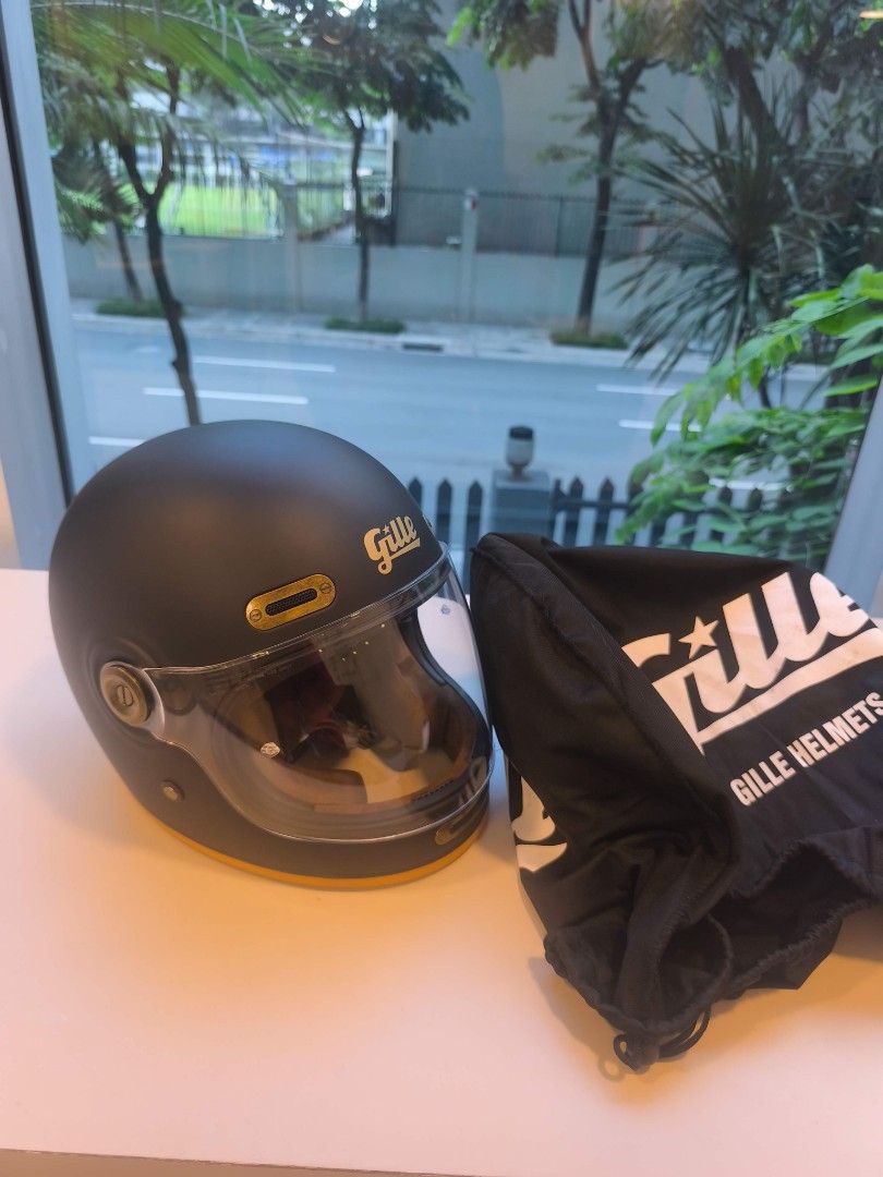 Gille Helmets Matte Black Full Face Motorcycle Helmet with Visor (Medium) (Category: Helmets and other Riding Gears) located in Taguig. Submitted by juliestjuly (Listing ID 1444518937, Image 2). Description: - Barely used - Medium size - Matte black Gille helmet - Comes with a clear visor - with extra black visor - Features a stylish yellow accent - Includes a black Gille branded helmet bag - Ideal for all your rides.