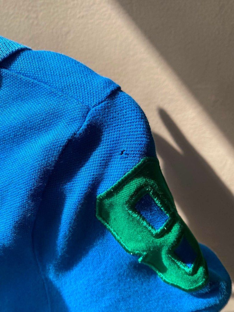Giordano Polo Shirt - Blue (Category: Shirts) located in Manila. Submitted by ysa236 (Listing ID 1444503803, Image 3). Description: - Brand: Giordano - Color: Bright Blue with Green accents - Material: Premium comfort blend — 95% Cotton, 5% Lycra/Spandex for a flexible, flattering fit. - Size: can fit XS-S - Overall Fit: Slim-fit women's polo - Condition: 6.5/10 (Pre-loved with minor flaws) I want to be completely transparent about the condition 