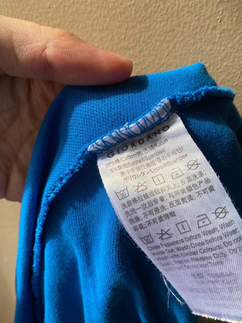 Giordano Polo Shirt - Blue (Category: Shirts) located in Manila. Submitted by ysa236 (Listing ID 1444503803, Image 2). Description: - Brand: Giordano - Color: Bright Blue with Green accents - Material: Premium comfort blend — 95% Cotton, 5% Lycra/Spandex for a flexible, flattering fit. - Size: can fit XS-S - Overall Fit: Slim-fit women's polo - Condition: 6.5/10 (Pre-loved with minor flaws) I want to be completely transparent about the condition 