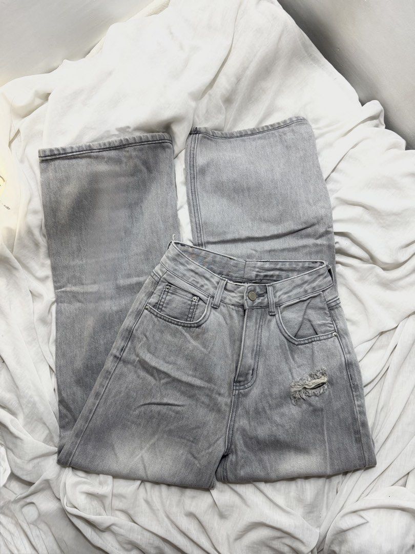 Grey Distressed Wide Leg Jeans (Category: Jeans) located in Manila. Submitted by missp. (Listing ID 1444640904, Image 1). Description: - Grey wide leg jeans - High waisted fit - Distressed details on the knees - Relaxed, casual style - Perfect for everyday wear.