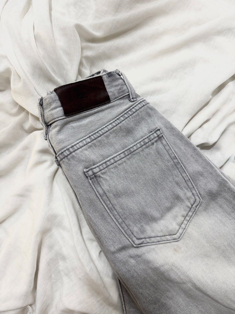 Grey Distressed Wide Leg Jeans (Category: Jeans) located in Manila. Submitted by missp. (Listing ID 1444640904, Image 3). Description: - Grey wide leg jeans - High waisted fit - Distressed details on the knees - Relaxed, casual style - Perfect for everyday wear.
