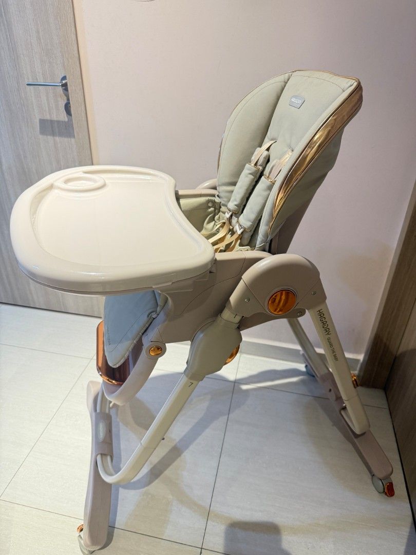 HAGADAY Foldable Baby High Chair with Dual Trays (Category: Baby High Chairs) located in Singapore. Submitted by nobodychampion (Listing ID 1444557992, Image 1). Description: - Brand new HAGADAY baby high chair - Adjustable height - Dual removable trays for easy cleaning - Adjustable safety straps - Padded seat for baby's comfort - Lockable wheels for convenient mobility - Reclining backrest (lies flat) - Ideal for meal times - Suitable for babie