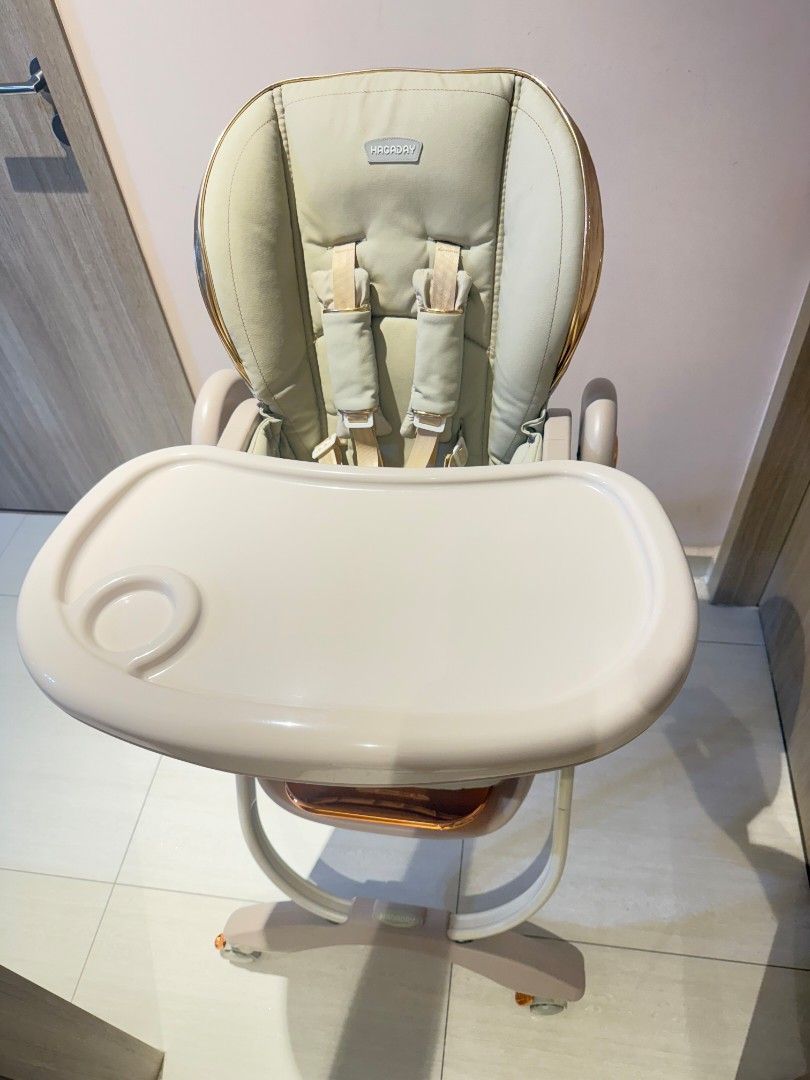 HAGADAY Foldable Baby High Chair with Dual Trays (Category: Baby High Chairs) located in Singapore. Submitted by nobodychampion (Listing ID 1444557992, Image 3). Description: - Brand new HAGADAY baby high chair - Adjustable height - Dual removable trays for easy cleaning - Adjustable safety straps - Padded seat for baby's comfort - Lockable wheels for convenient mobility - Reclining backrest (lies flat) - Ideal for meal times - Suitable for babie