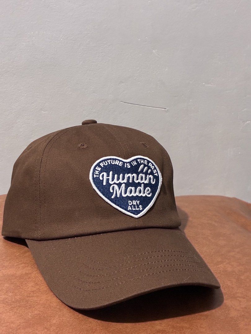 Human Made Heart Logo 6 Panel Twill Cap (Category: Caps & Hats) located in Tarlac. Submitted by ayla.shop (Listing ID 1444657685, Image 2). Description: Human Made 6 Panel Twill Cap Heart Logo Patch Brown Color ( Navy Heart Patch ) Brandnew & Authentic LBC or J&T Express.
