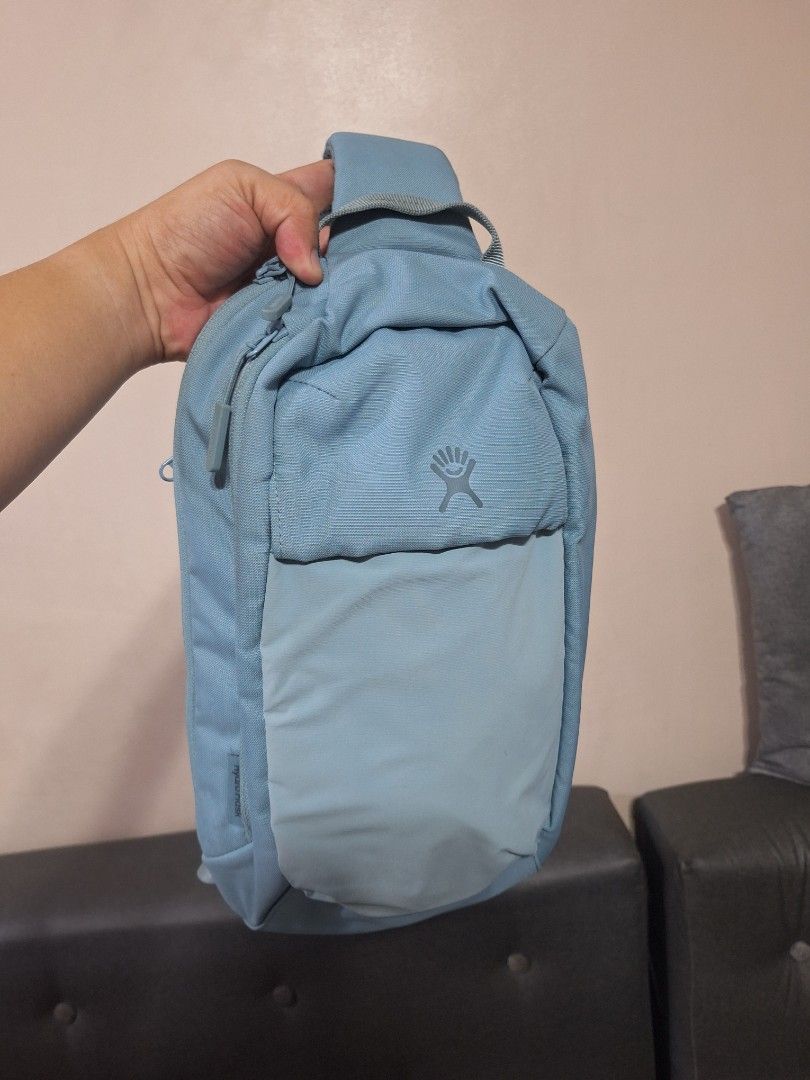 Hydro Flask Slingback Bottle Pack Baltic (Category: Sling Bags) located in Manila. Submitted by caster_tee (Listing ID 1444554089, Image 3). Description: - Hydro Flask Slingback Bottle Pack in Baltic color - Versatile bag for essentials and your water bottle - Ideal for day trips and everyday use - Features multiple compartments for organized storage - Adjustable strap for a comfortable, customized fit purchase at 4k+ in travel club outlet.