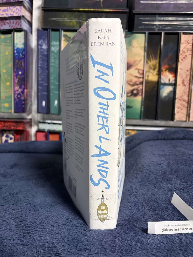 In Other Lands by Sarah Rees Brennan (Category: Storybooks) located in Makati City. Submitted by kevinscorner (Listing ID 1444600724, Image 2). Description: In Other Lands by Sarah Rees Brennan - ex-library hardcover with sticker/tape residue and stamps - rare out of print hardcover.