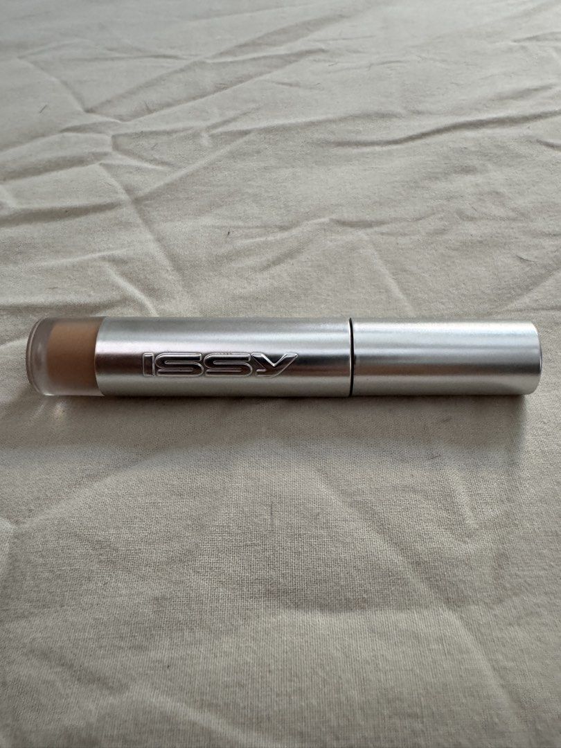 Issy Under Eye Brightening Corrector (Category: Makeup) located in Makati City. Submitted by rafaelrrenzo (Listing ID 1444500745, Image 1). Description: Swatched only Guy owned I tried wearing makeup but didn’t work for me Tan Peach.