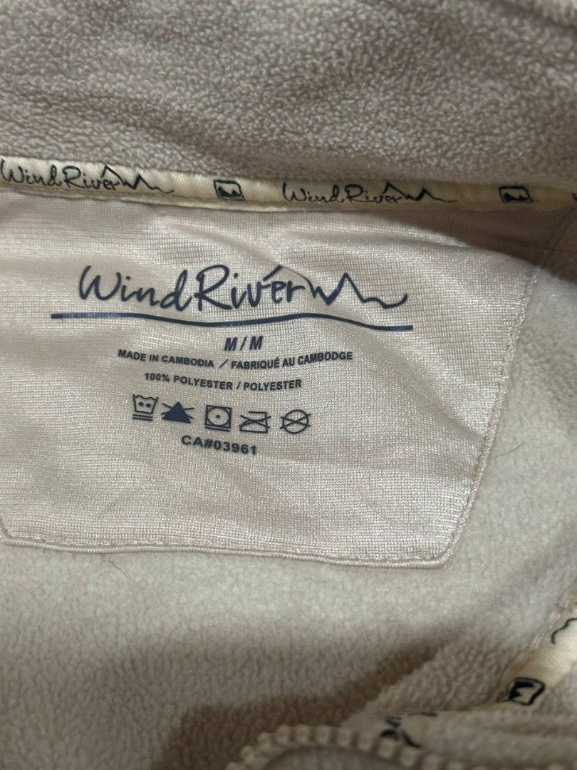 Jacket (Category: Coats, Jackets and Outerwear) located in Baliuag. Submitted by hezdeishathrifting (Listing ID 1444617420, Image 3). Description: Wind River brand beige fleece jacket features a full-zip front, a tall stand collar, and convenient side pockets. 📍Size M 📍Conditions 8-9 📍Price ; 150php..