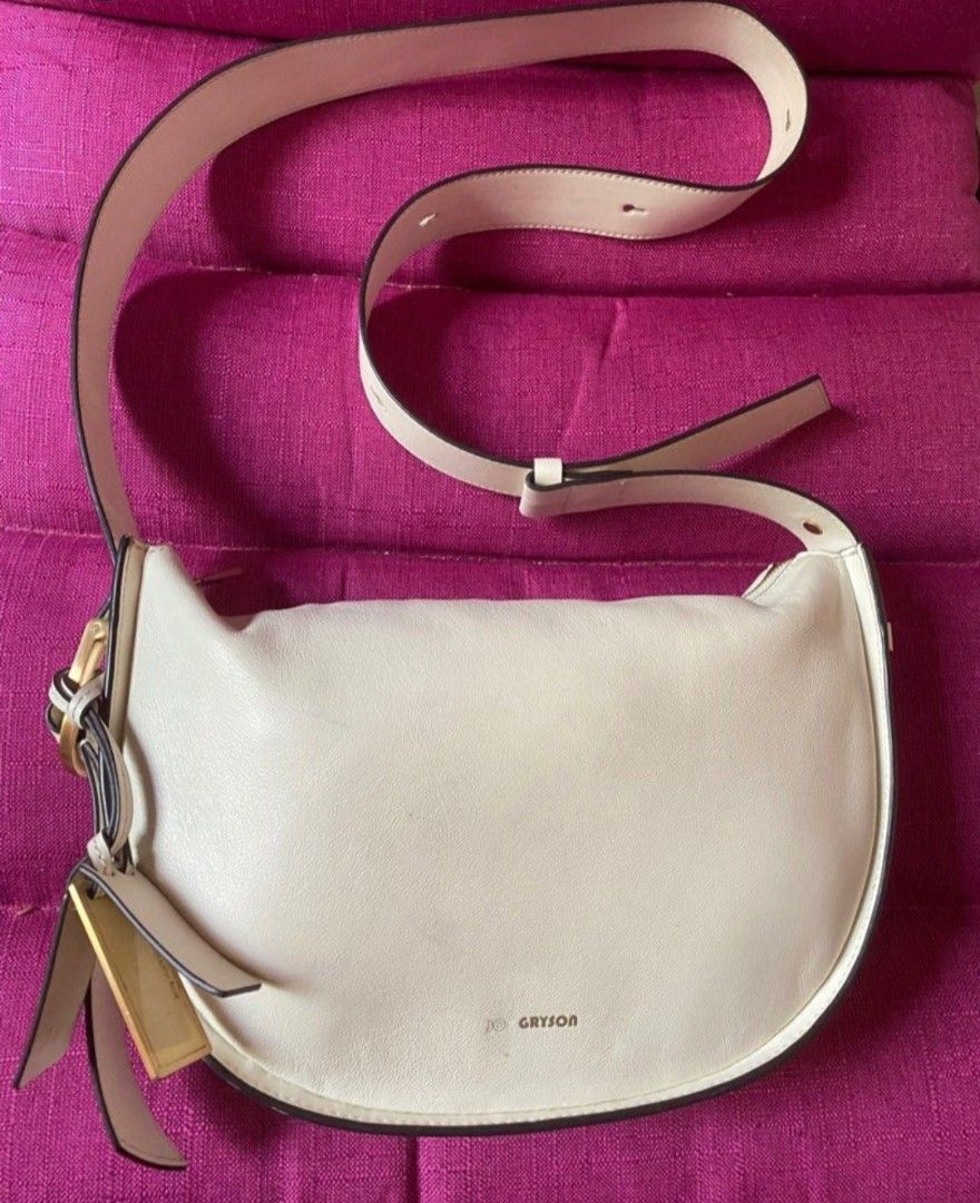 Joy Gryson White Sierra Shoulder Bag (Category: Shoulder Bags) located in Quezon City. Submitted by lordsblessing (Listing ID 1444559073, Image 2). Description: Original Joy Gryson bag from Korea. Used in K-Drama, True Beauty 😊 With missing 'JOY' at the front logo. See last 2 pics for minor flaws. But overall bag is still in nice condition..