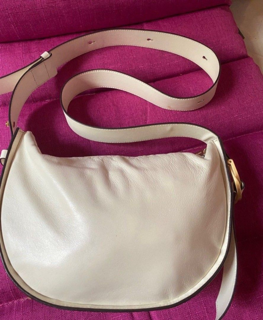 Joy Gryson White Sierra Shoulder Bag (Category: Shoulder Bags) located in Quezon City. Submitted by lordsblessing (Listing ID 1444559073, Image 3). Description: Original Joy Gryson bag from Korea. Used in K-Drama, True Beauty 😊 With missing 'JOY' at the front logo. See last 2 pics for minor flaws. But overall bag is still in nice condition..