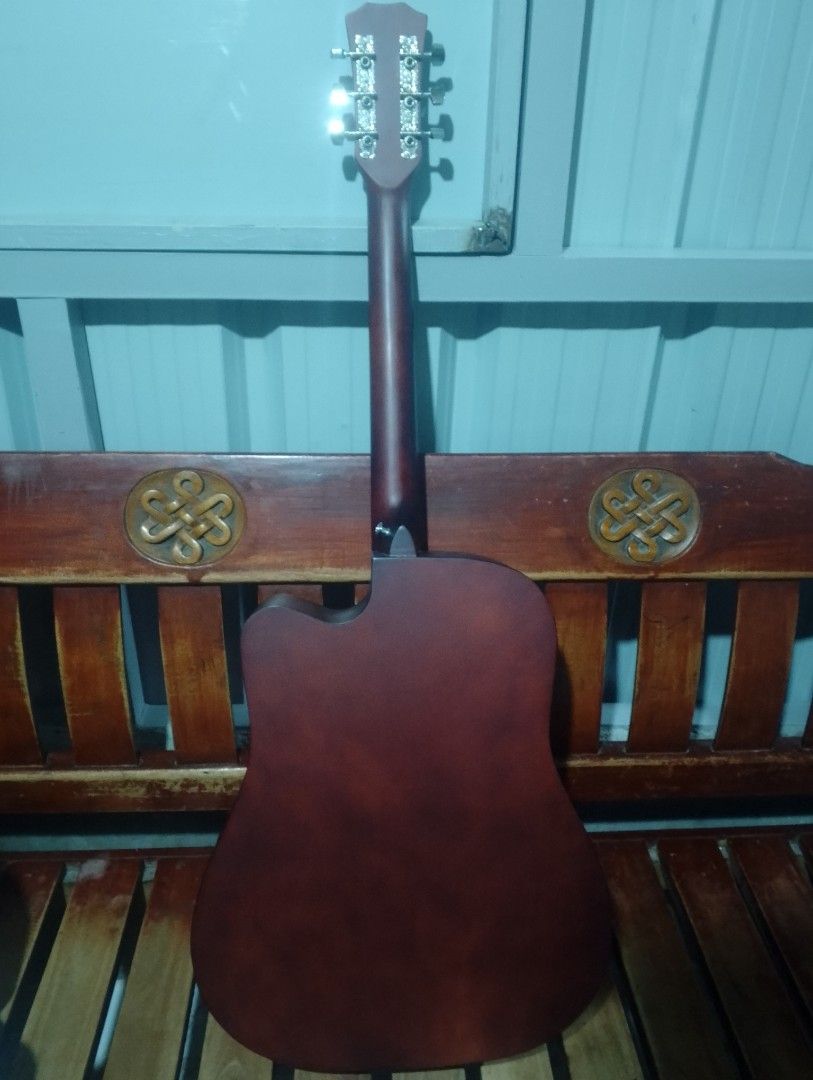 KAWES Acoustic Guitar Sunburst (Category: Musical Instruments) located in Manila. Submitted by godzilla5647 (Listing ID 1444614687, Image 2). Description: - KAWES Acoustic Guitar - Beautiful Sunburst finish on the front - Dark wood back and neck - Standard 6-string configuration - Comfortable cutaway body style - Ideal for beginners or as a secondary guitar - Tuners conveniently located on the headstock - Made in China.