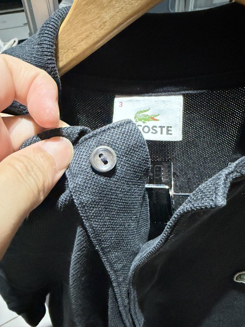 Lacoste Black Polo Shirt Size 3 (Category: Tshirts & Polo Shirts ) located in Quezon City. Submitted by r_decluttering (Listing ID 1444614697, Image 2). Description: Lacoste Black Polo Shirt Size 3 | 20x26.5 Good Condition.