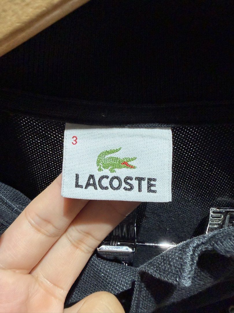 Lacoste Black Polo Shirt Size 3 (Category: Tshirts & Polo Shirts ) located in Quezon City. Submitted by r_decluttering (Listing ID 1444614697, Image 3). Description: Lacoste Black Polo Shirt Size 3 | 20x26.5 Good Condition.