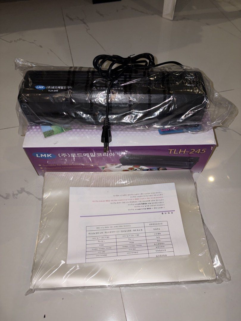 LMK TLH-245 A4 Hot & Cold Laminator (Category: Printers, Scanners & Copiers) located in Mabalacat. Submitted by shngttuc (Listing ID 1444601335, Image 2). Description: FOR SALE: LMK TLH-245 A4 Hot & Cold Laminator Brand new at hindi pa nagagamit. Complete set with power cord and manual. May kasamang laminating film sheets/pouches. Perfect para sa IDs, certificates, flashcards, photos, at mga importanteng dokumento. ✔ Hot & Cold Laminating ✔ A4 Si