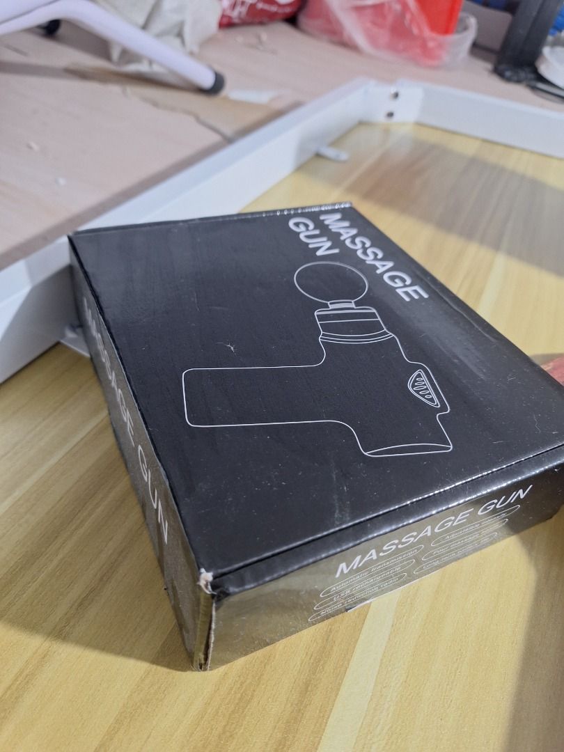 Massage Gun - Black (Category: Massage Devices) located in Quezon City. Submitted by camille_cr (Listing ID 1444643920, Image 2). Description: Orig price: 710.00 Rfs: Di nagagamit; tambak lang - Black massage gun - Comes in original packaging - Includes foam head attachment - Ideal for muscle recovery and relaxation - Easy to hold and operate.