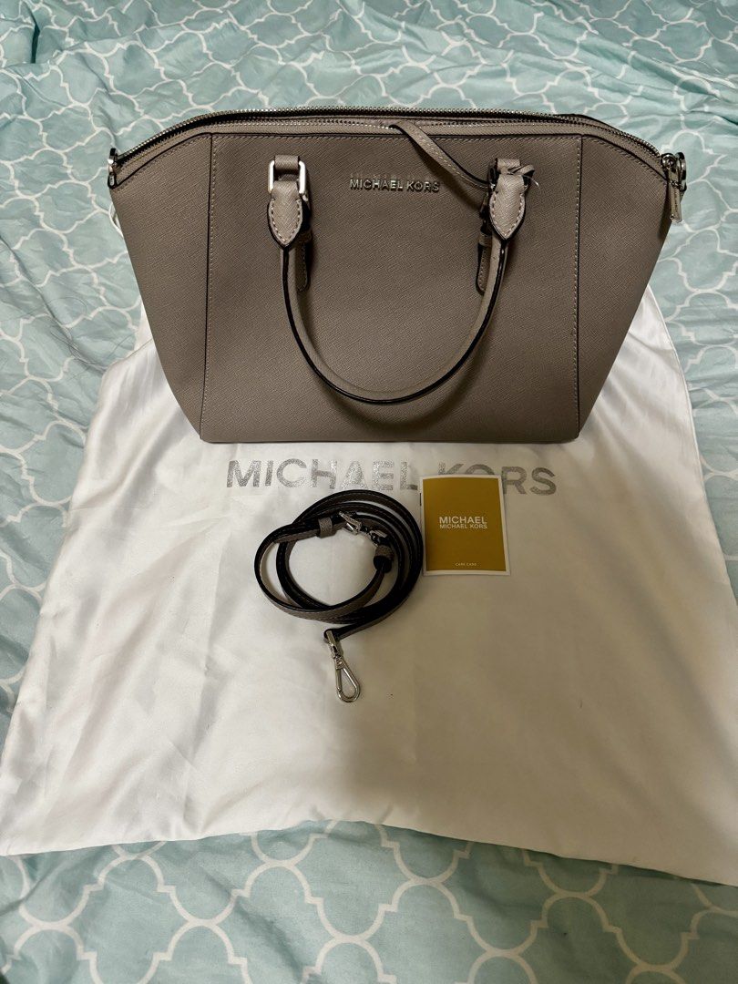 Michael Kors Grey Leather Satchel Handbag - Large (Category: Shoulder Bags) located in Las Pinas. Submitted by cire09. (Listing ID 1444518456, Image 3). Description: Authentic Grey Michael Kors Satchel Bought in US Comes with Dust Bag, Strap, and Care Card Never been used.