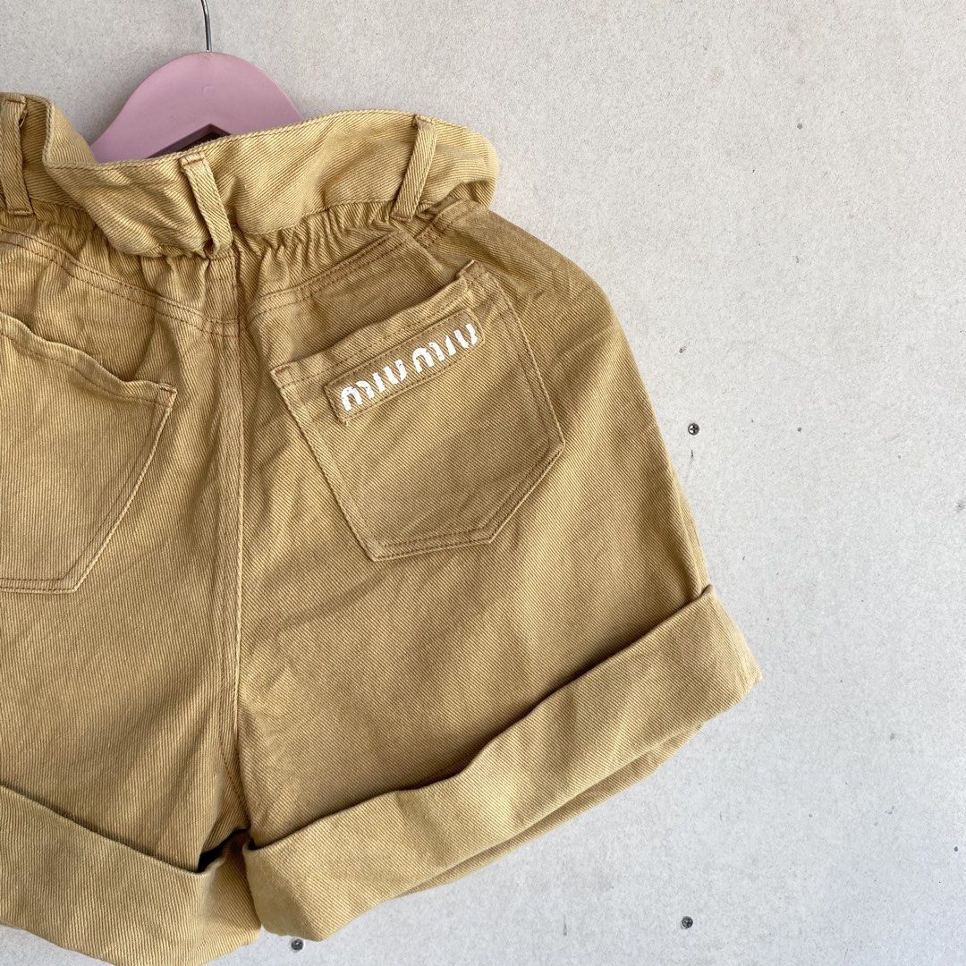 Miu Miu Drill High Waisted Shorts (Category: Shorts) located in Cebu City. Submitted by kklez (Listing ID 1444534400, Image 3). Description: Authenticity is not guaranteed Product is Off/Legit In Excellent Condition - Issue: Broken(1) butones see last pic - 24 up to 28 Waist Size.