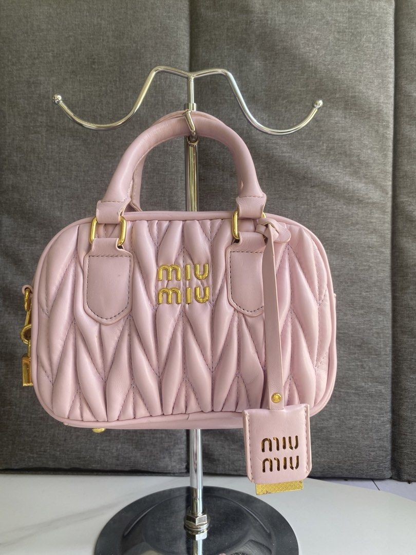Miu Miu Matelassé Mini Bag Pink (Category: Luxury Bags & Wallets) located in Dumaguete. Submitted by rl.bagsavenue (Listing ID 1444649559, Image 2). Description: - Super cute Miu Miu mini bag - Pink color with gold hardware - Quilted matelassé design - Top handle and detachable shoulder strap - Includes a small white tag inside - Ideal for carrying essentials.