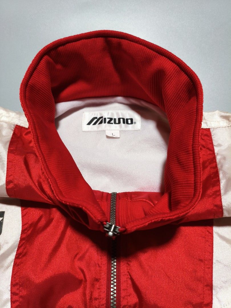 Mizuno Red Blue and White Jacket (Reworked) (Category: Coats, Jackets and Outerwear) located in Pasig City. Submitted by tobyrama (Listing ID 1444664624, Image 2). Description: ✔️ Brand: Mizuno ✔️ Design: Reworked Colorblock Jacket ✔️ Color: Red / Blue / White ✔️ Size: Large on tag ✔️ Condition: Well used it has been reworked to short sleeves ✔️ Dimensions: length: 25 inches width: 21 inches sleeves length: 7½ inches Can do J&T shipping or Lalamo