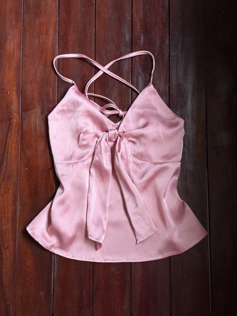Just Because Studio Pink Natalia Top (Category: Sets or Coordinates) located in Taytay. Submitted by shopdiarybya (Listing ID 1444604855, Image 2). Description: very carrie bradshaw ! 🩷🤎 Just Because Studio Natalia Top: Silk top in pink, with adjustable spaghetti straps that tie in the back and a tie-front bow. ♡ fits XS-S ♡ bust 32-34” waist 27” dm for more details 💌.