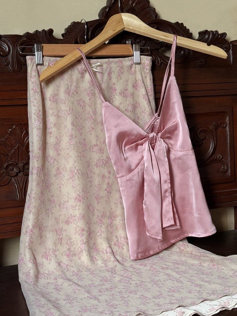 Just Because Studio Pink Natalia Top (Category: Sets or Coordinates) located in Taytay. Submitted by shopdiarybya (Listing ID 1444604855, Image 1). Description: very carrie bradshaw ! 🩷🤎 Just Because Studio Natalia Top: Silk top in pink, with adjustable spaghetti straps that tie in the back and a tie-front bow. ♡ fits XS-S ♡ bust 32-34” waist 27” dm for more details 💌.