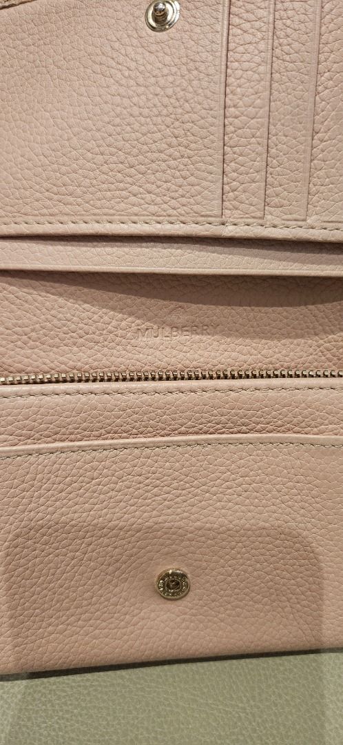 Mulberry Tree French Purse Wallet (Category: Luxury Bags & Wallets) located in Quezon City. Submitted by prelovedpieces0808 (Listing ID 1444549191, Image 3). Description: - Authentic Preloved Mulberry Tree French Purse Wallet in Rosewater Small Classic Grain with Gold Hardware - Crafted from premium textured leather - Multiple card slots for organization - Convenient zipped coin compartment - Secure snap button closure - Compact and small, fits e